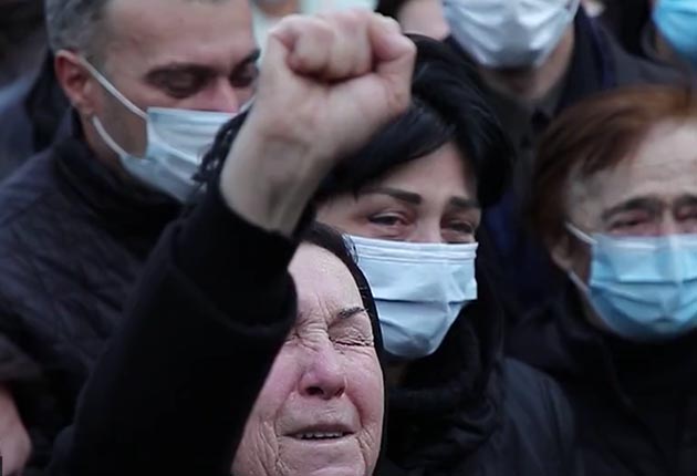 Gürcüler, Ukrayna'daki Savaşta Ölen Kahramanlarına Ağlıyor 